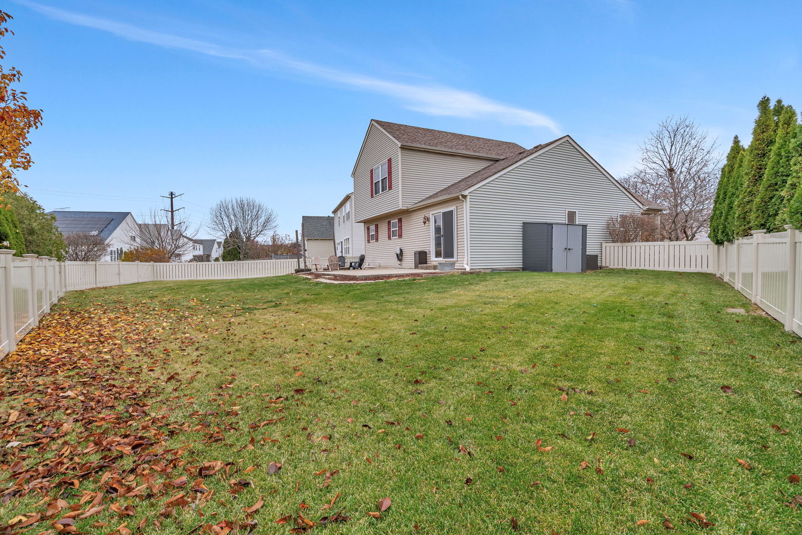 1605 Heritage Pointe Court Plainfield, IL 60586 - Photo 19 of 21 a view of a house with a yard