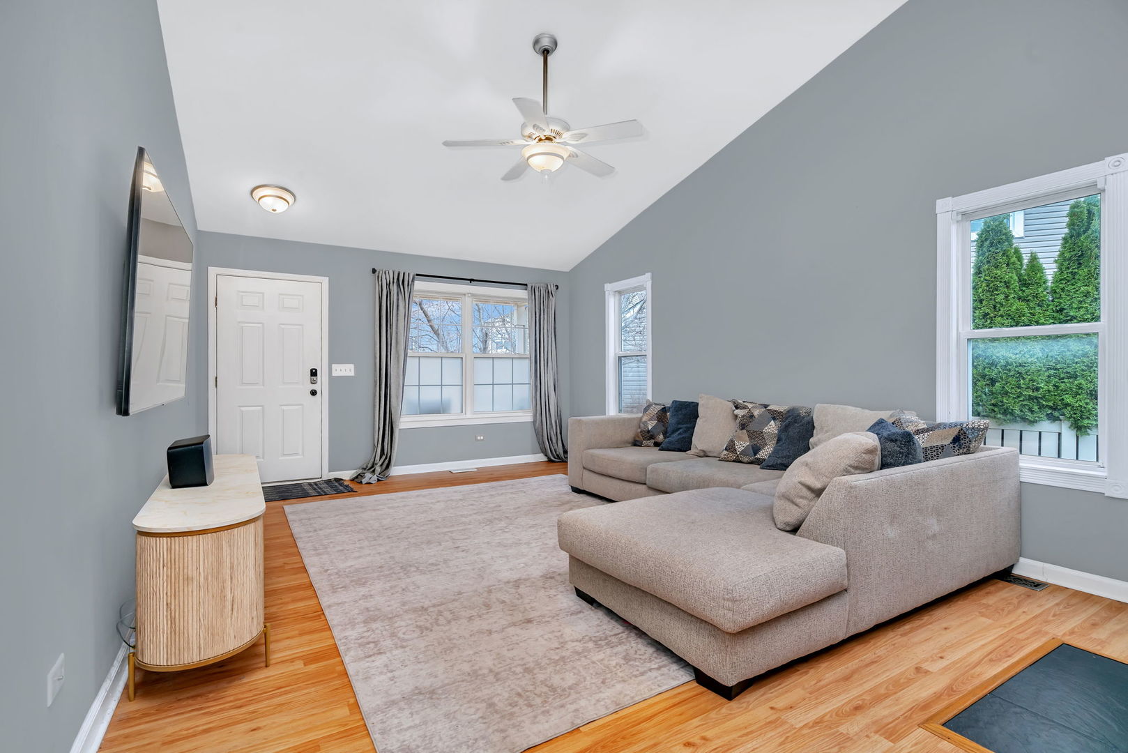 1605 Heritage Pointe Court Plainfield, IL 60586 - Photo 2 of 21 a living room with furniture and a large window