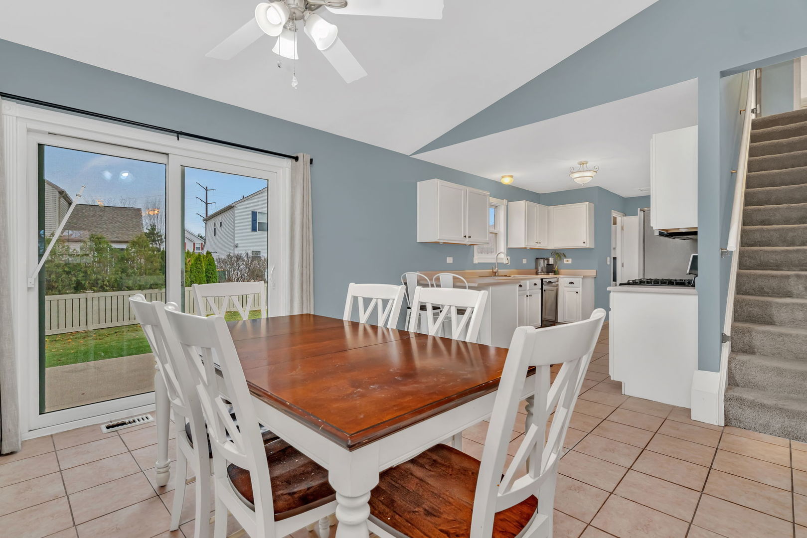 1605 Heritage Pointe Court Plainfield, IL 60586 - Photo 6 of 21 a view of a dining room with furniture window and wooden floor
