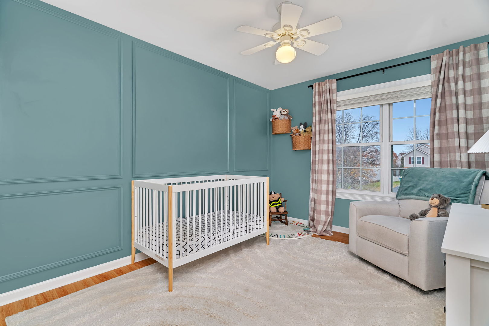 1605 Heritage Pointe Court Plainfield, IL 60586 - Photo 9 of 21 a view of a livingroom with furniture and a chandelier fan