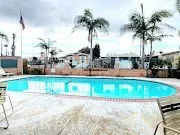 an ocean view with outdoor seating