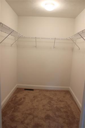 91 North Road Chelmsford, MA 01824 - Photo 17 of 27 a view of a room with racks on the wall