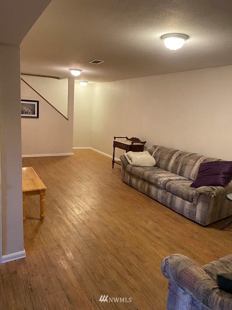 802 South 5th Street Dayton, WA 99328 - Photo 16 of 20 a living room with furniture and a couch