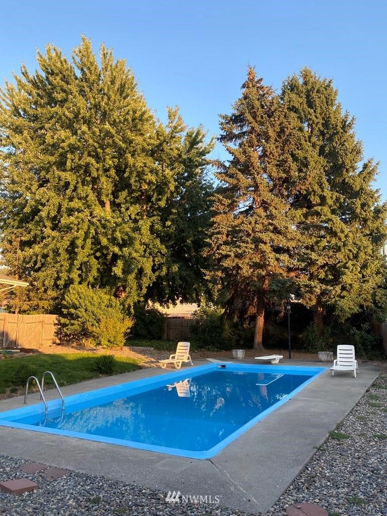 802 South 5th Street Dayton, WA 99328 - Photo 6 of 20 a view of a field with large trees