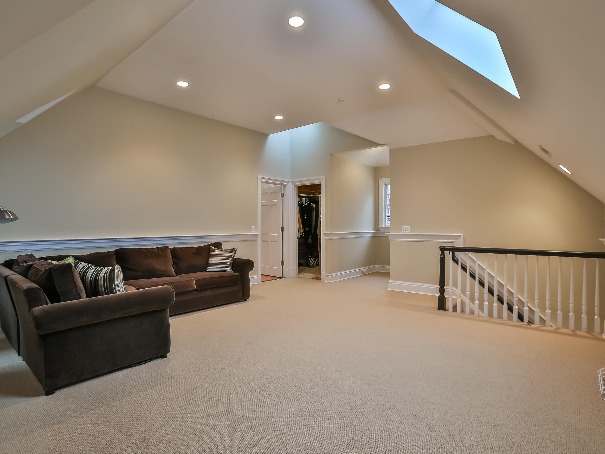 107 Dunning Road New Canaan, CT 06840 - Photo 21 of 31 a living room with furniture and a ceiling fan