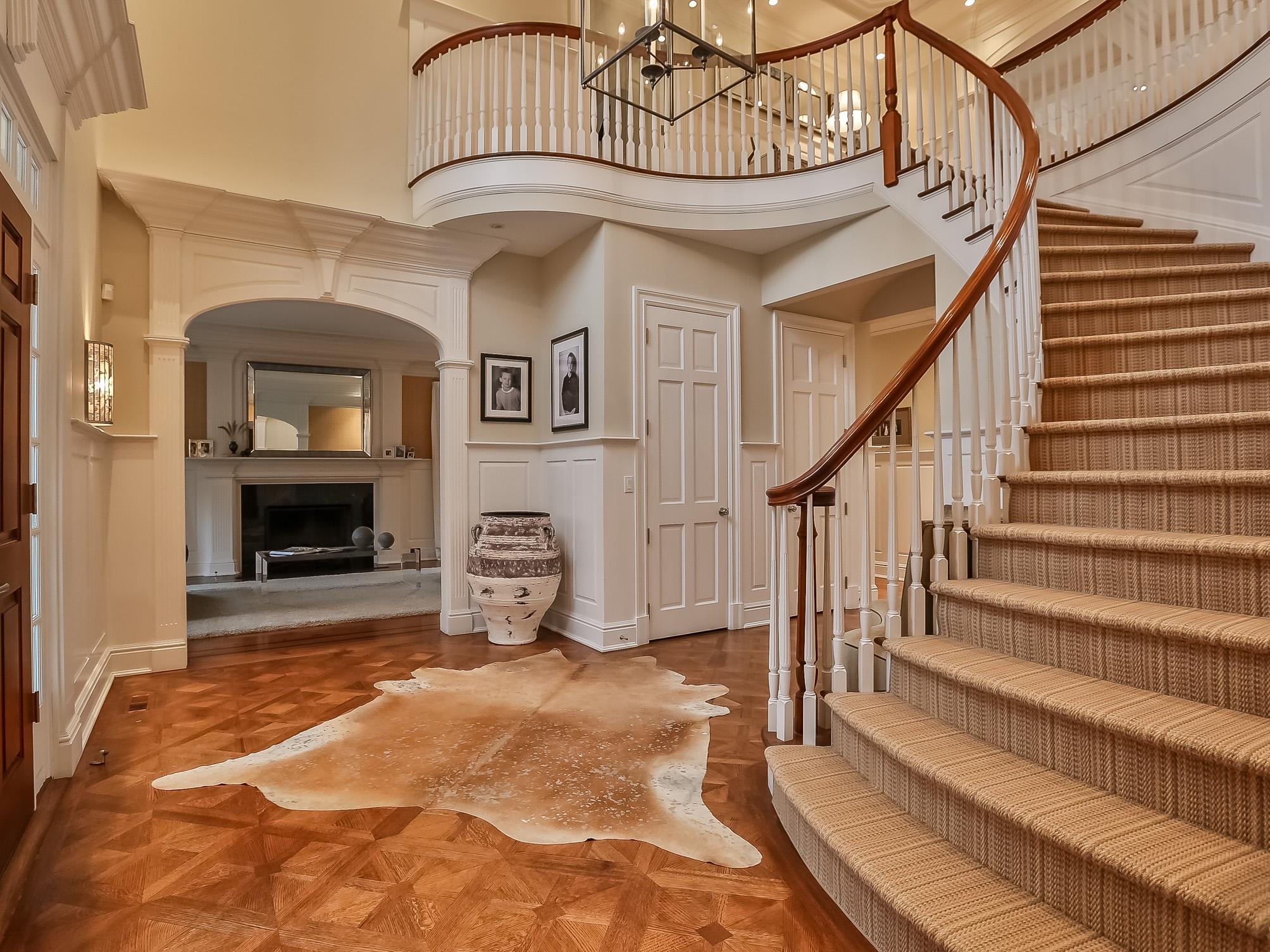 107 Dunning Road New Canaan, CT 06840 - Photo 3 of 31 a view of entryway and hall with a fireplace