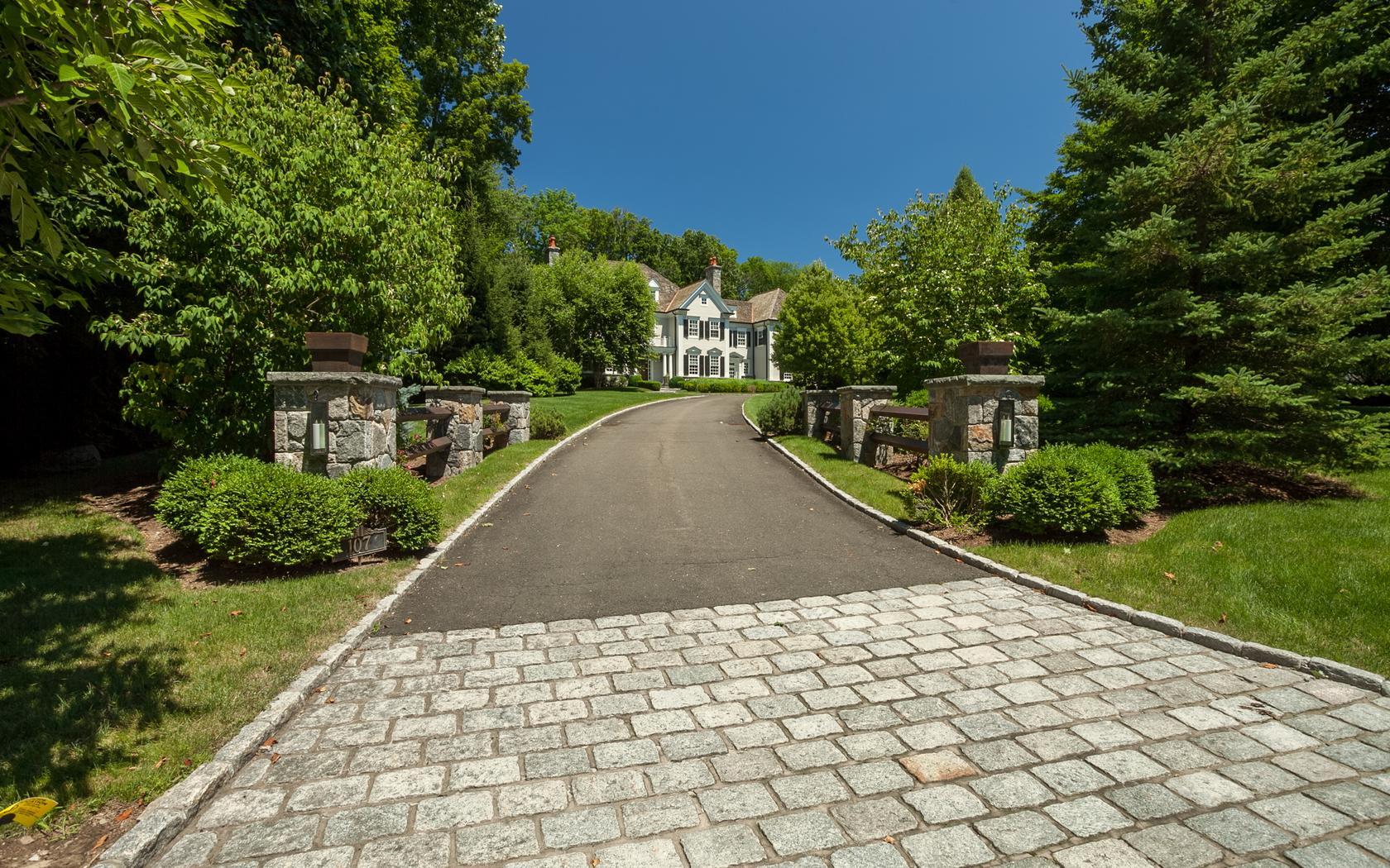 107 Dunning Road New Canaan, CT 06840 - Photo 4 of 31 a view of a pathway with a yard