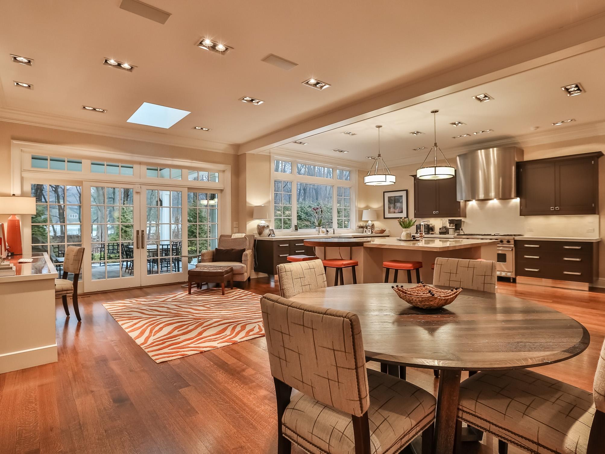107 Dunning Road New Canaan, CT 06840 - Photo 5 of 31 a large kitchen with a table and chairs