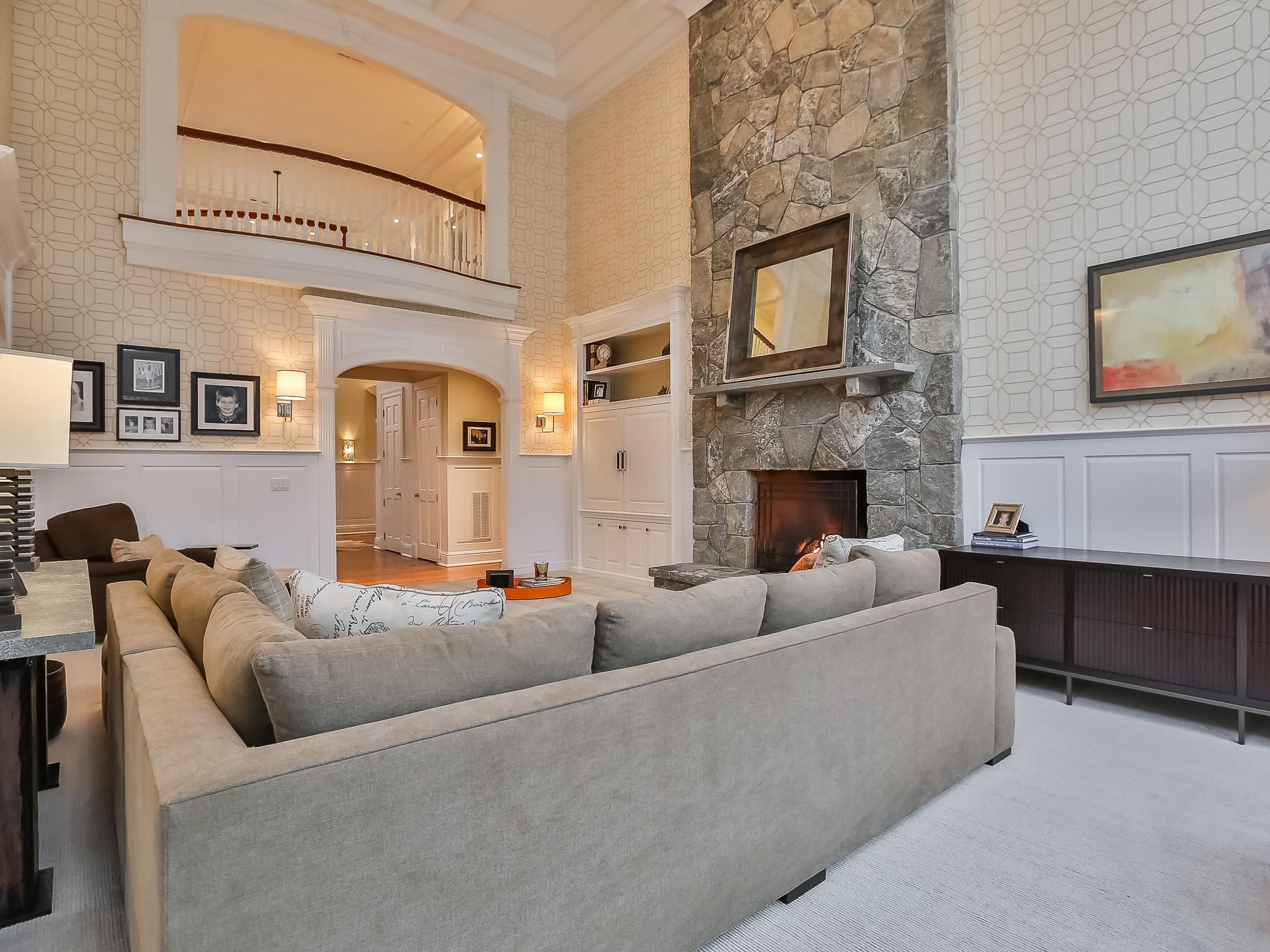 107 Dunning Road New Canaan, CT 06840 - Photo 9 of 31 a living room with furniture a fireplace and a flat screen tv