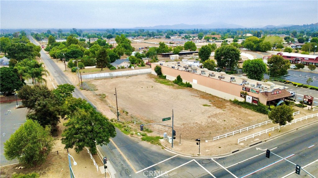 0 6th & Valleyview Norco, CA 92860 - Photo 2 of 9 an aerial view of a house with a yard and lake view