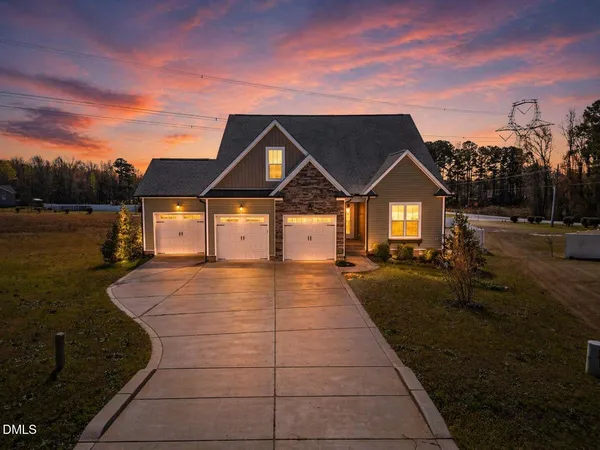 a house with trees in the background