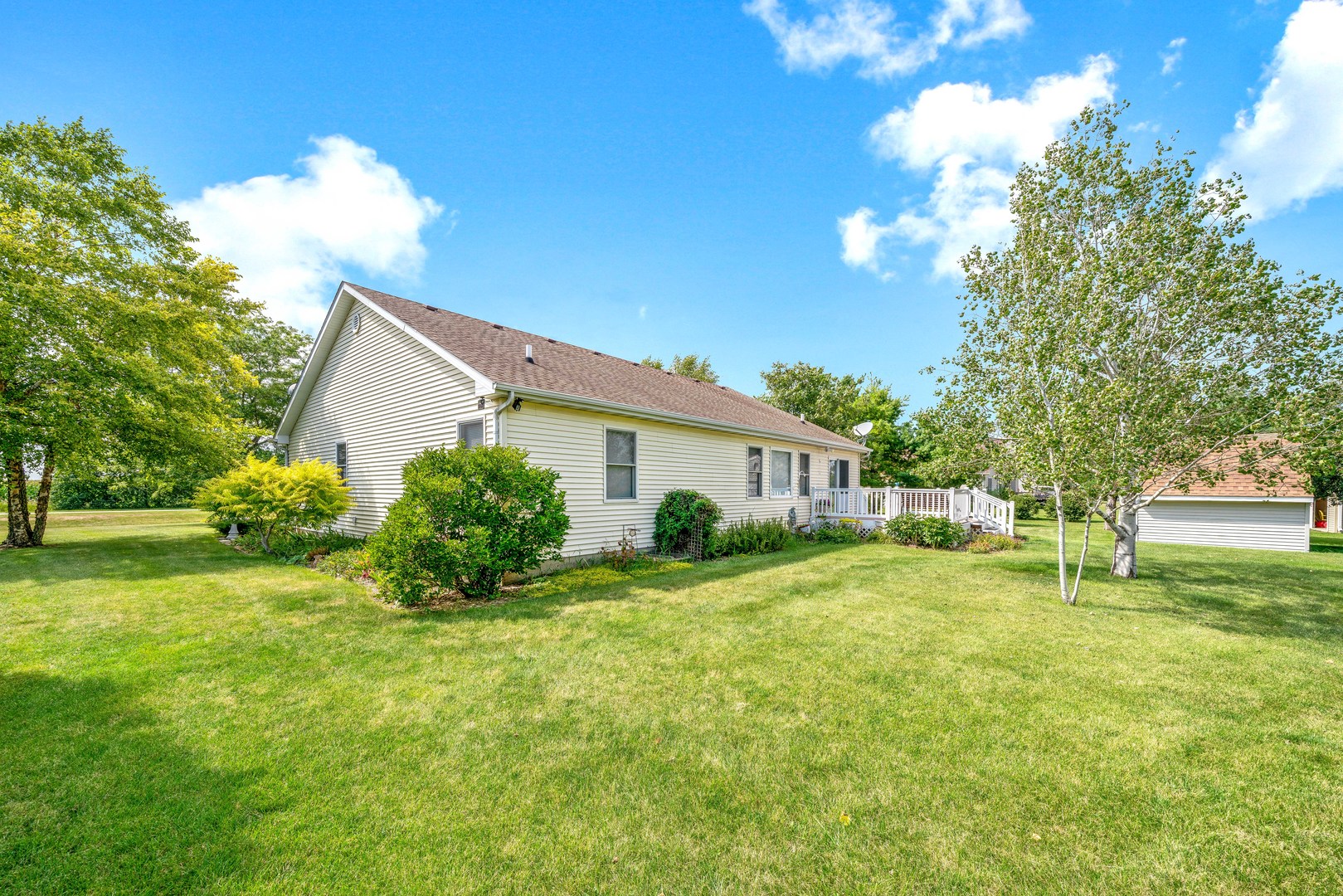 3970 East 2259th Road Serena, IL 60549 - Photo 24 of 39 a view of a house with a big yard and large trees