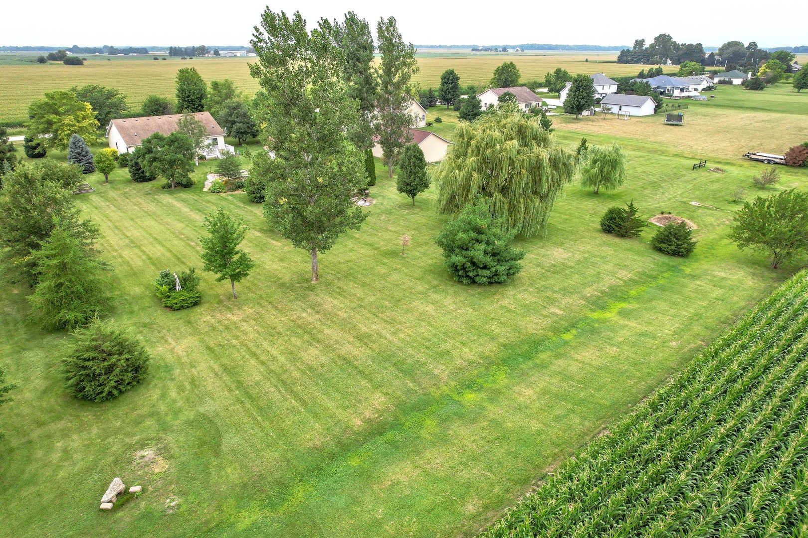 3970 East 2259th Road Serena, IL 60549 - Photo 34 of 39 a view of a garden with an ocean