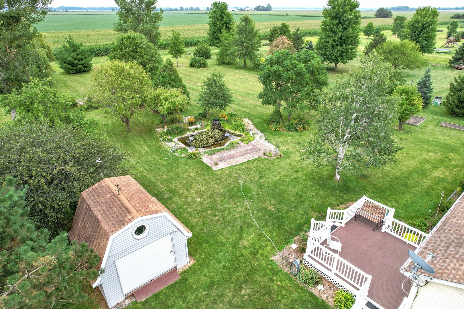 3970 East 2259th Road Serena, IL 60549 - Photo 38 of 39 a view of a house with a yard and trees