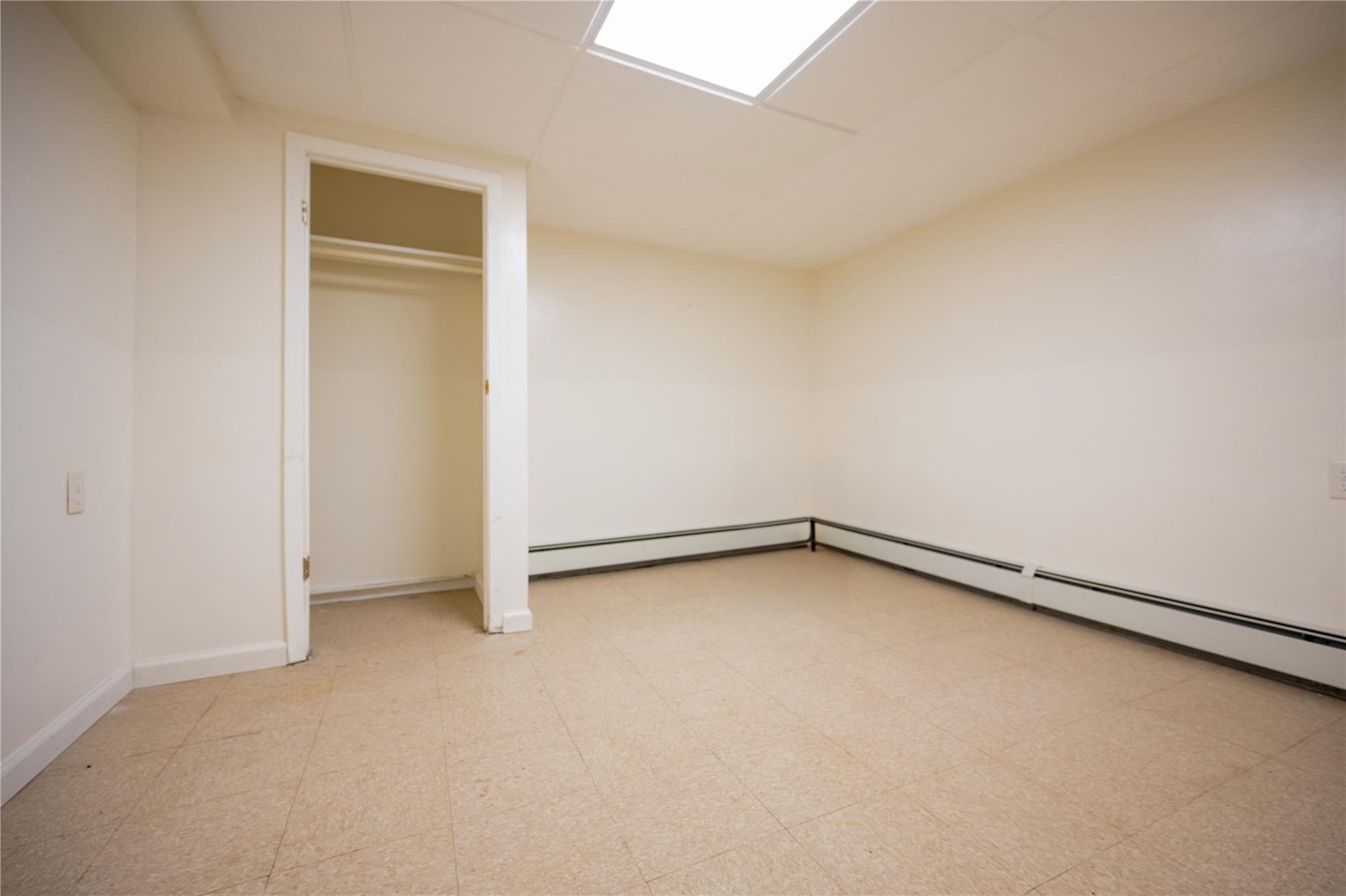 59-38 Xenia Street Queens, NY 11368 - Photo 16 of 16 a view of a room with an empty space