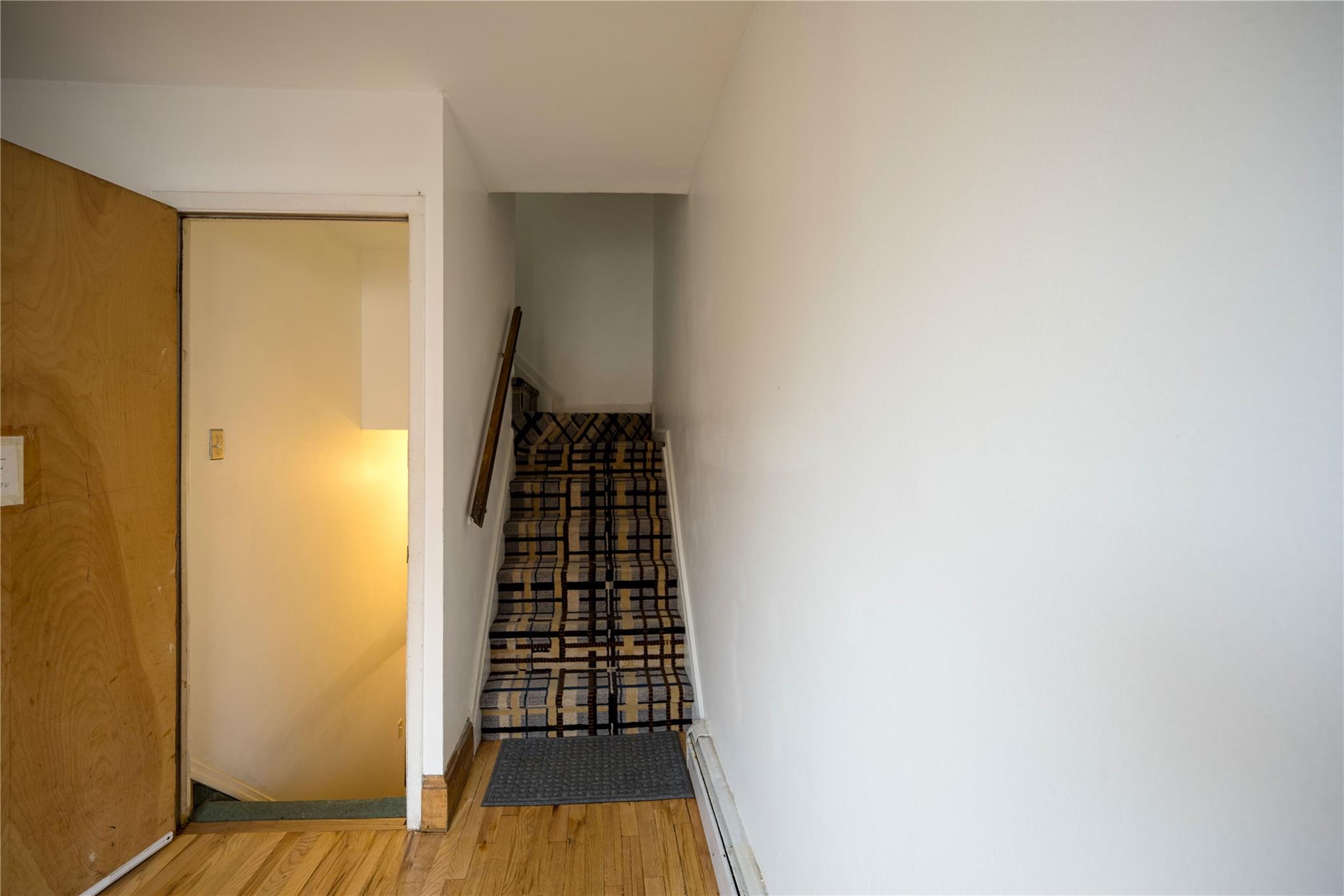 59-38 Xenia Street Queens, NY 11368 - Photo 3 of 16 a view of wooden floor in a room