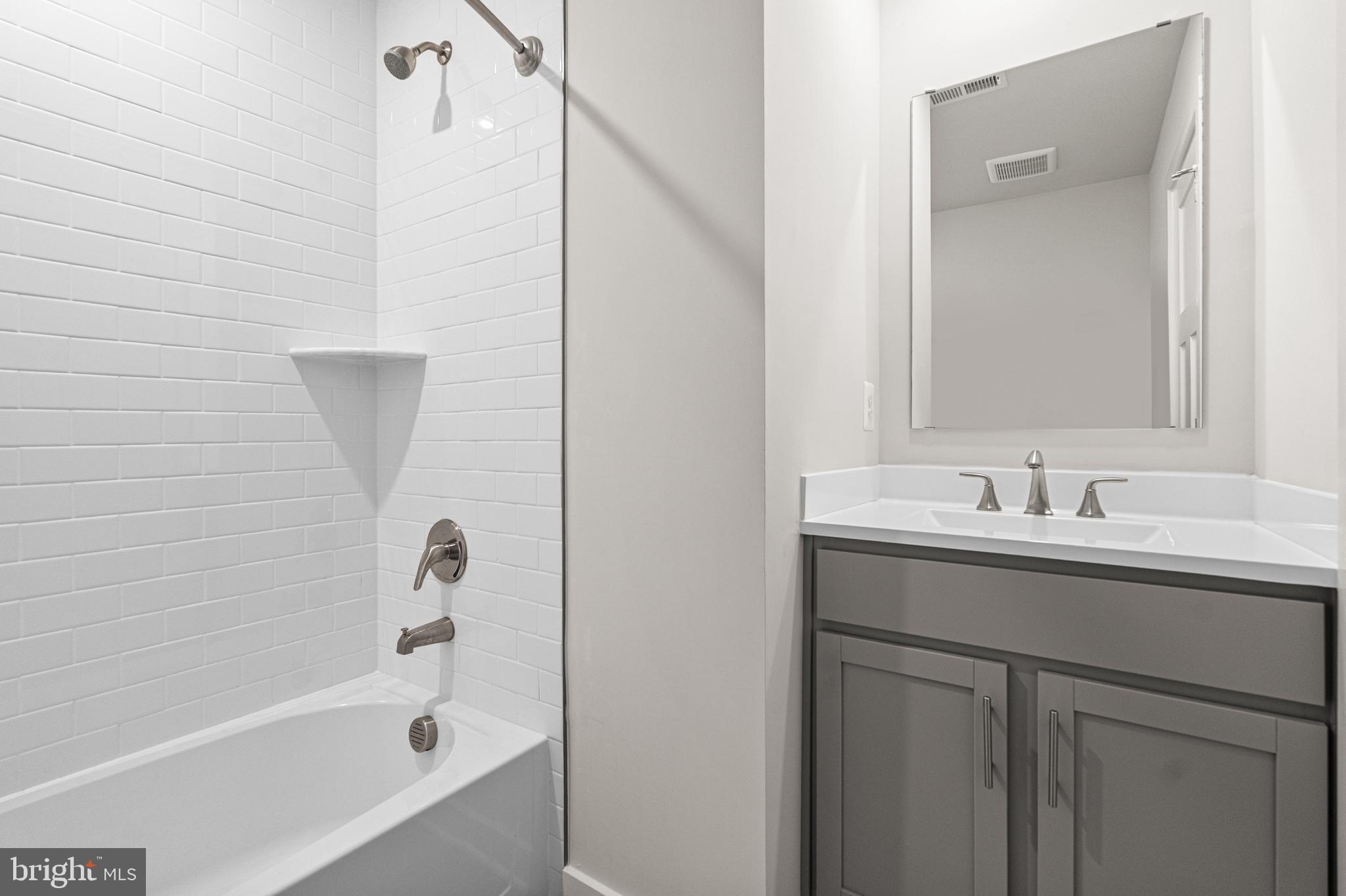 171 Huntwell W Avenue Ranson, WV 25438 - Photo 15 of 20 a bathroom with a bathtub and a sink