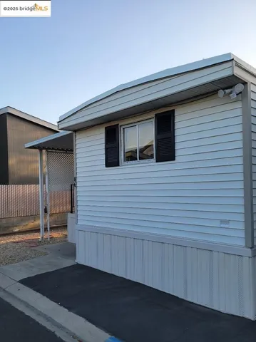 a view of a house with a deck
