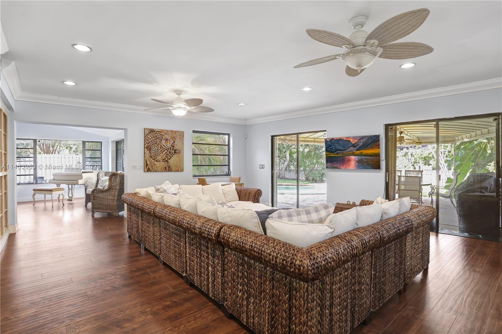 7700 Hawthorne Avenue Miami Beach, FL 33141 - Photo 36 of 36 a living room with furniture and a large window