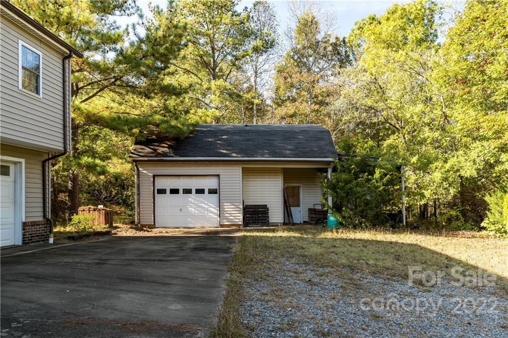 4750 Whiteside Road Bostic, NC 28018 - Photo 29 of 30 a front view of a house with garden