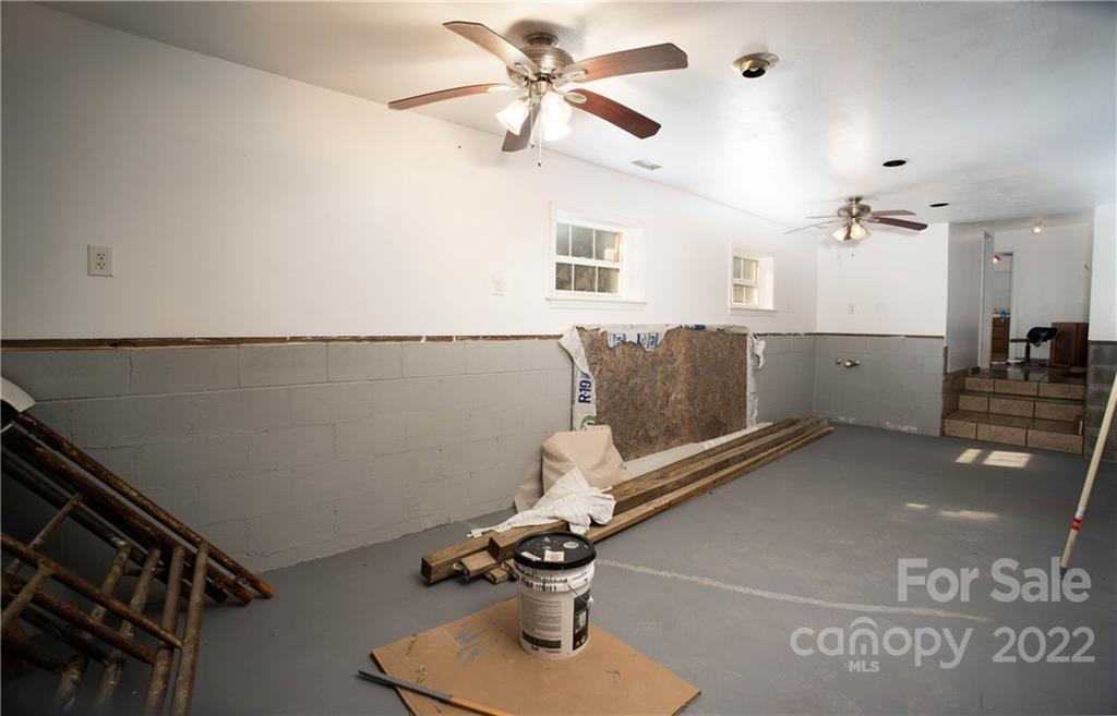 4750 Whiteside Road Bostic, NC 28018 - Photo 10 of 30 a room with gym equipment and view of living room