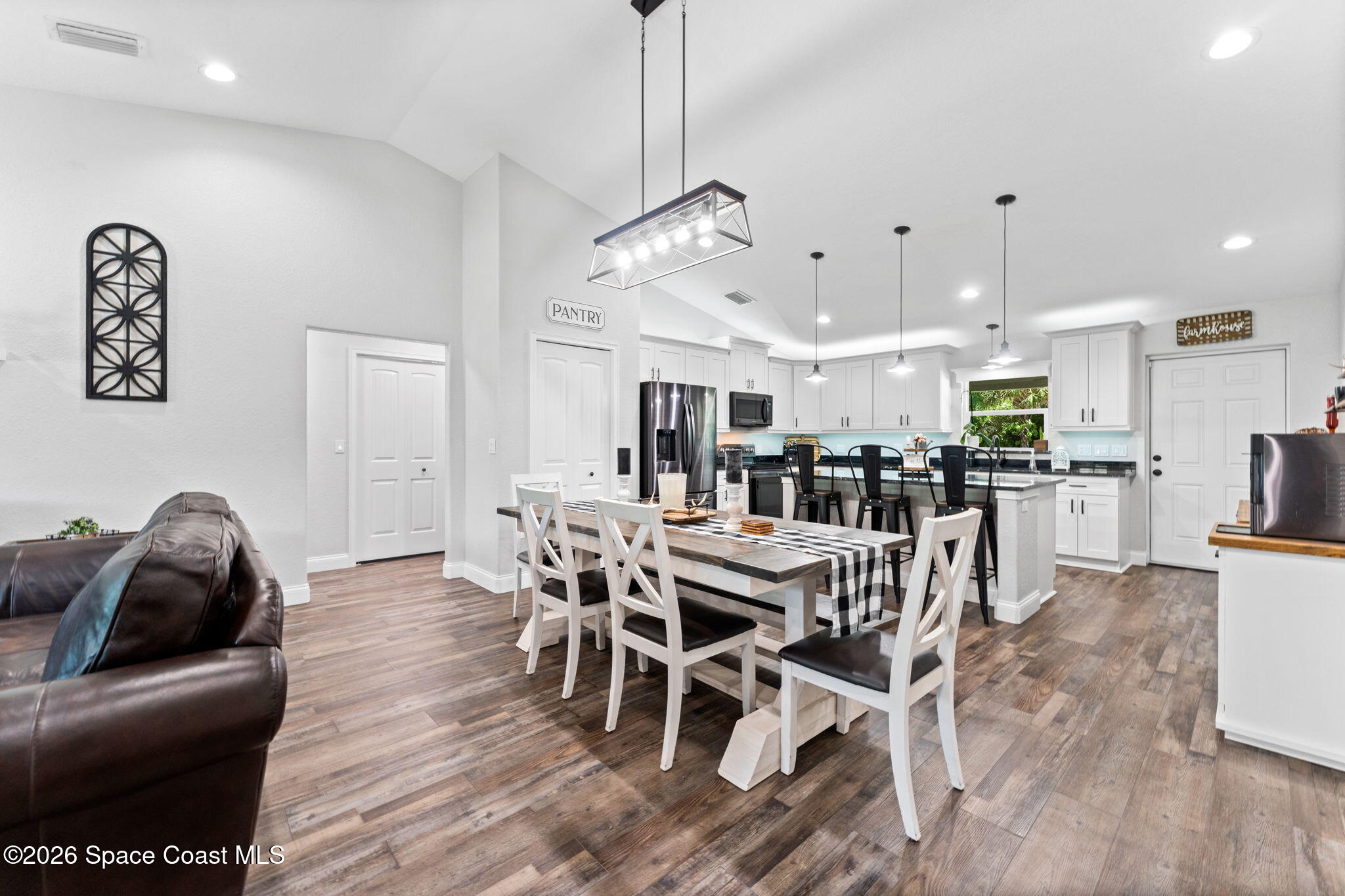 3760 Montgomery Road Mims, FL 32754 - Photo 10 of 46 living/dining/kitchen