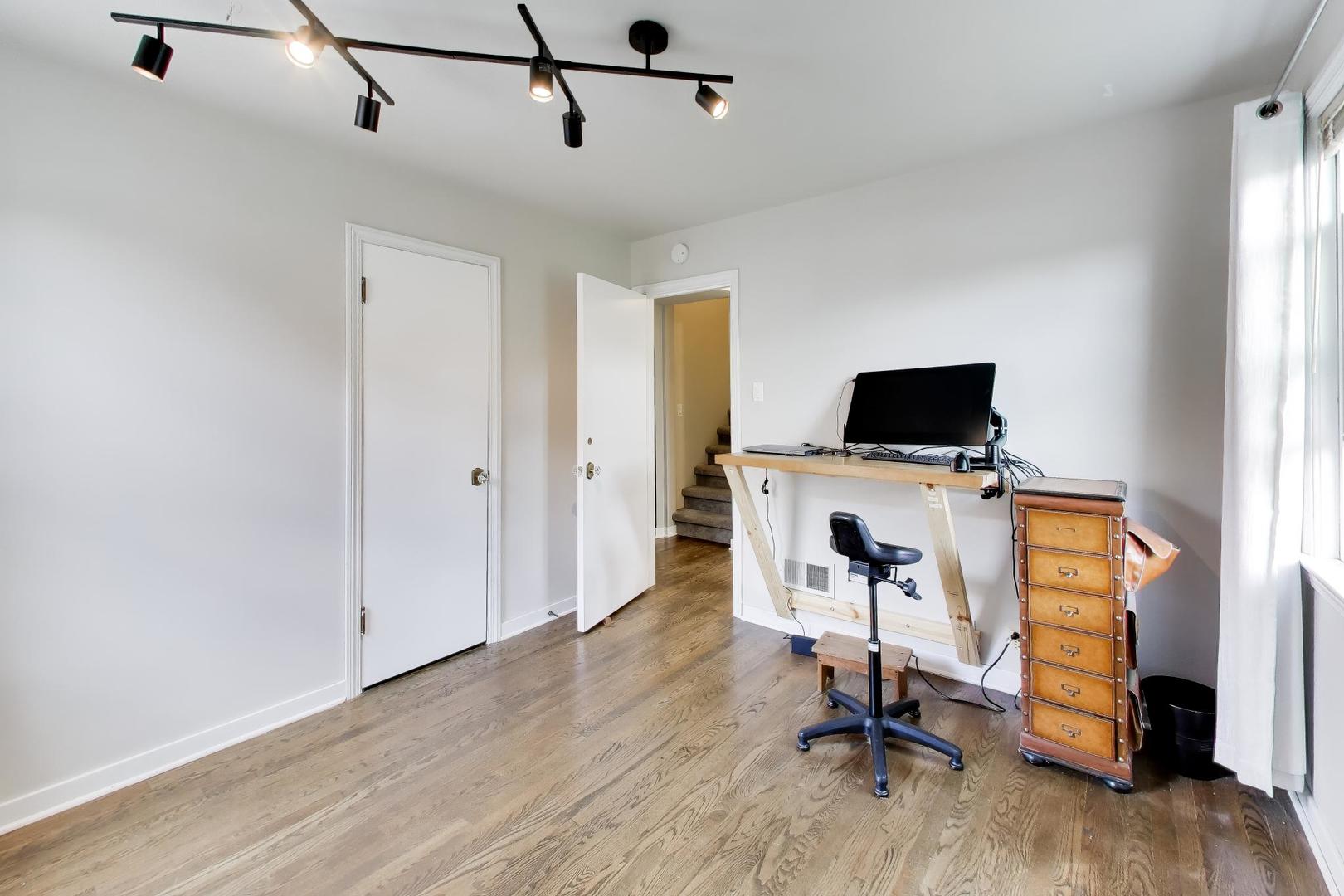 2536 5th Avenue North Riverside, IL 60546 - Photo 11 of 24 a view of a workspace with furniture and a window