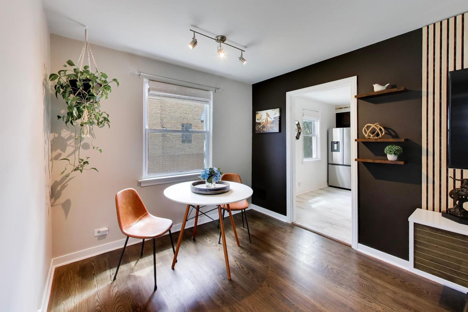 2536 5th Avenue North Riverside, IL 60546 - Photo 6 of 24 a view of a dining room with furniture and wooden floor