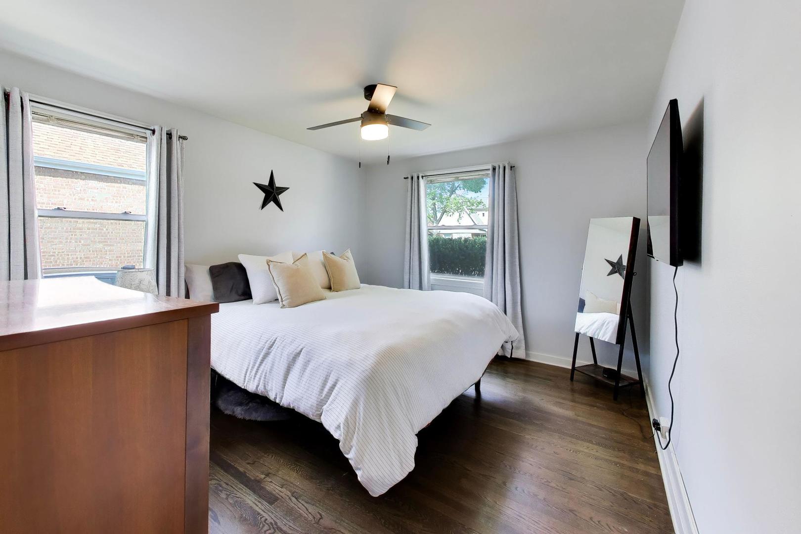 2536 5th Avenue North Riverside, IL 60546 - Photo 9 of 24 a bedroom with a bed and a large window