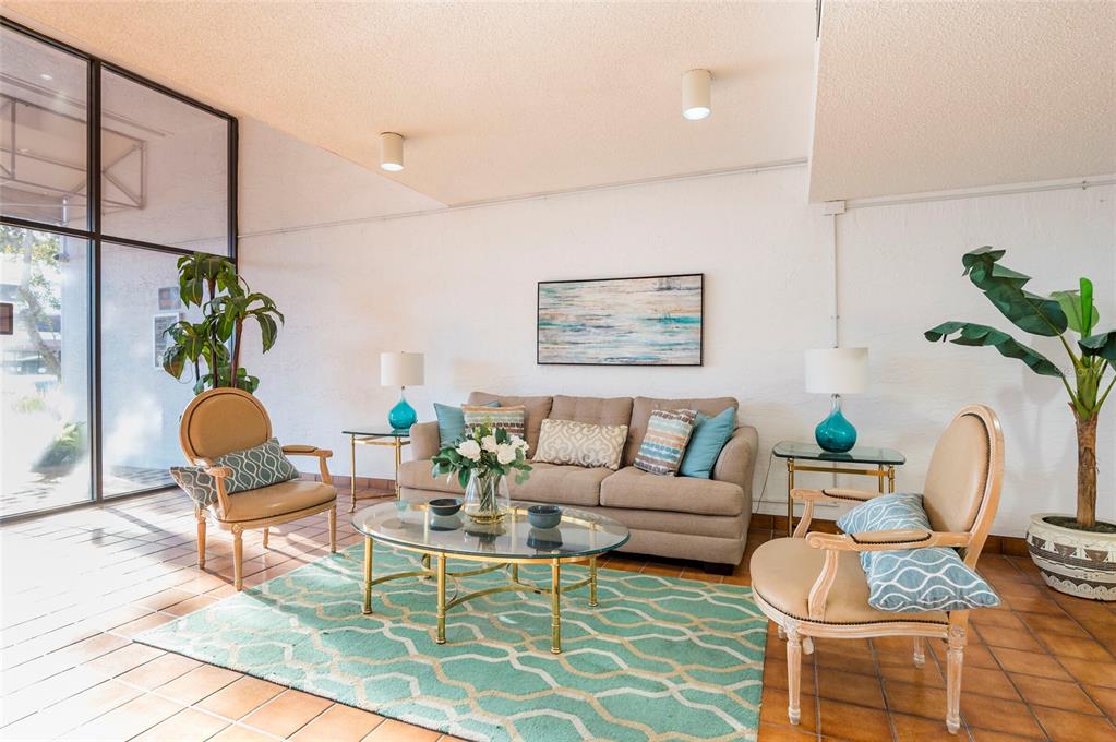 2593 Countryside Boulevard, Unit 7307 Clearwater, FL 33761 - Photo 25 of 32 a living room with furniture