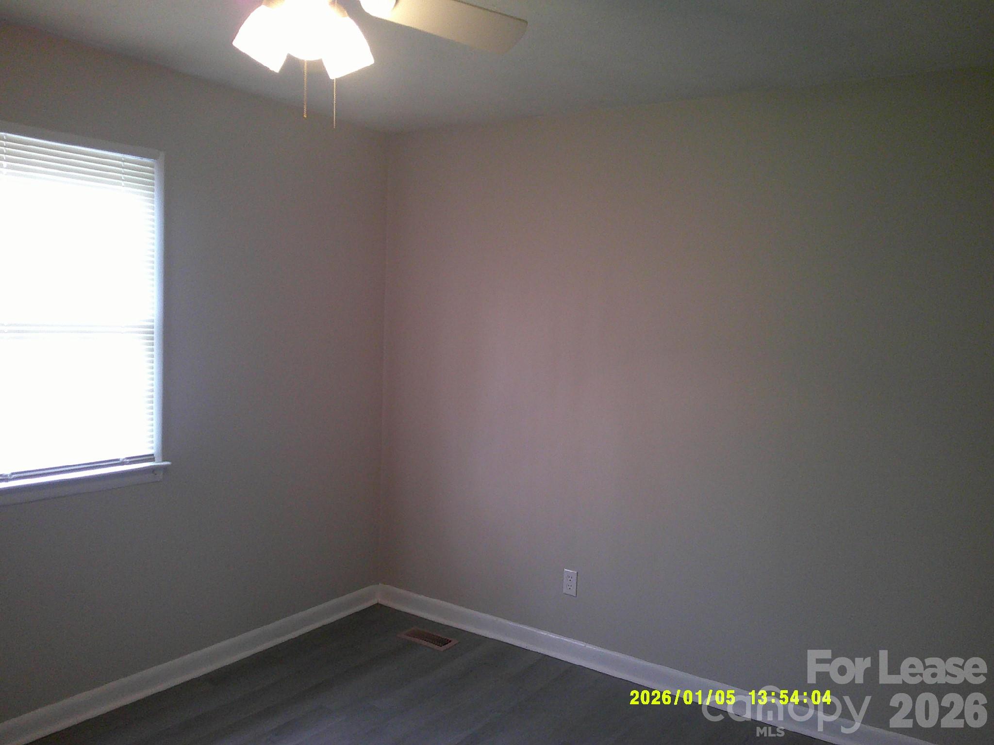 263 16th Avenue Northeast, Unit 7 Hickory, NC 28601 - Photo 8 of 8 an empty room with a window