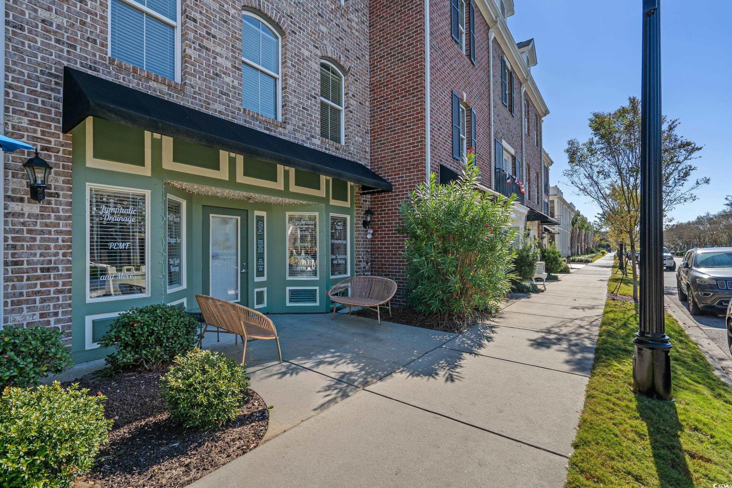 2798 Howard Avenue, Unit B Myrtle Beach, SC 29577 - Photo 2 of 40 View of exterior entry featuring brick siding