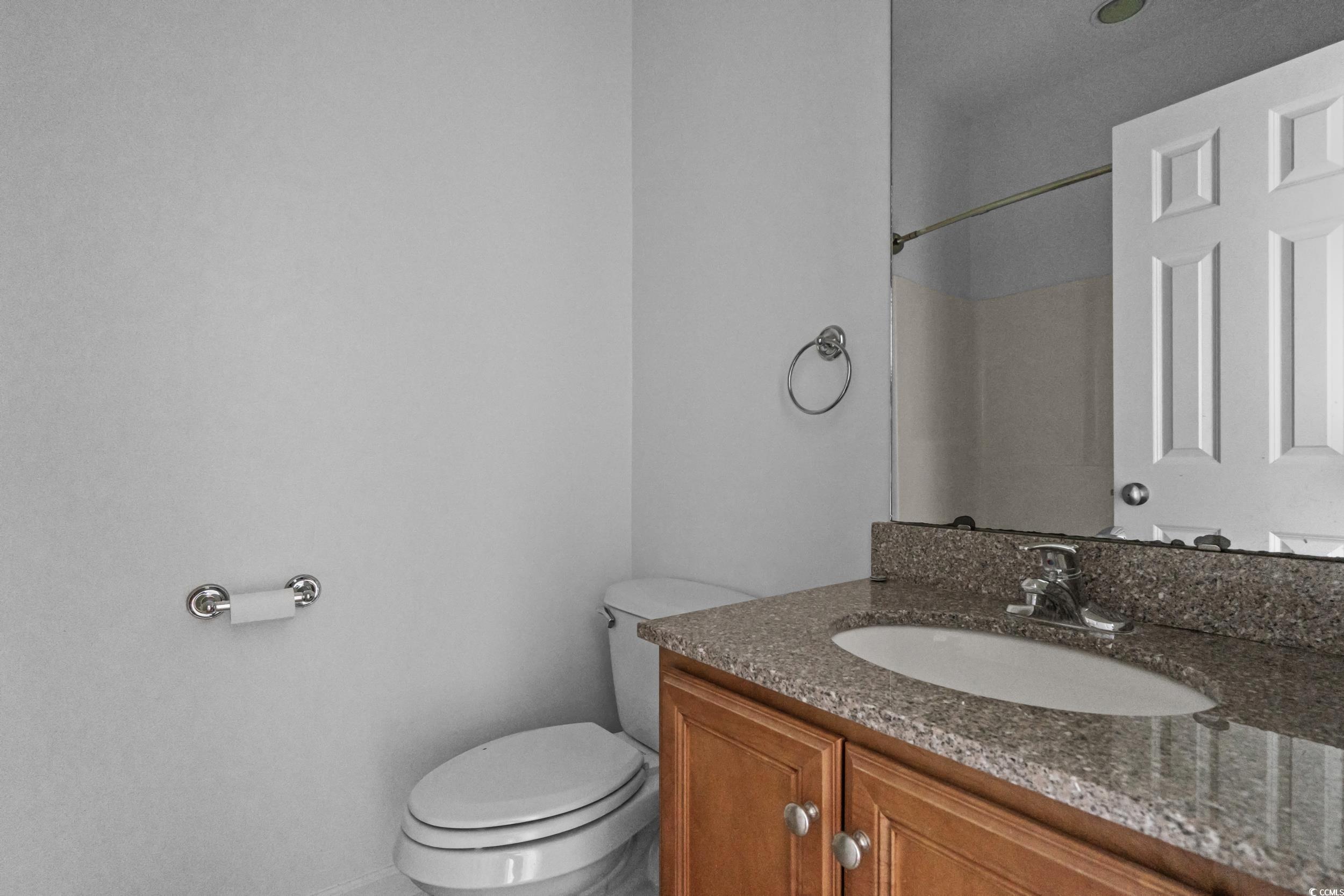 2798 Howard Avenue, Unit B Myrtle Beach, SC 29577 - Photo 23 of 40 Full bathroom with vanity and a shower