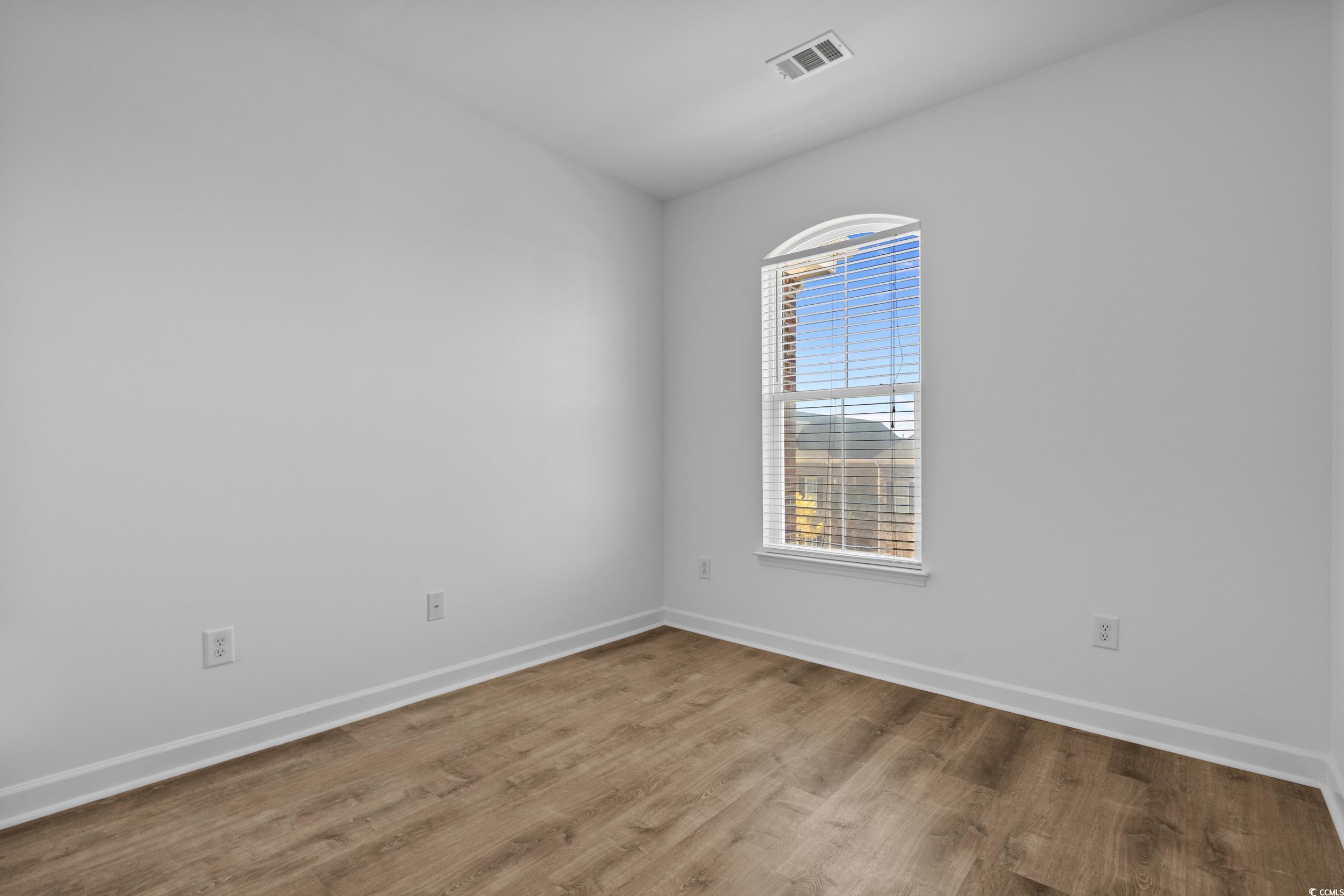 2798 Howard Avenue, Unit B Myrtle Beach, SC 29577 - Photo 24 of 40 Unfurnished room with baseboards and wood finished floors