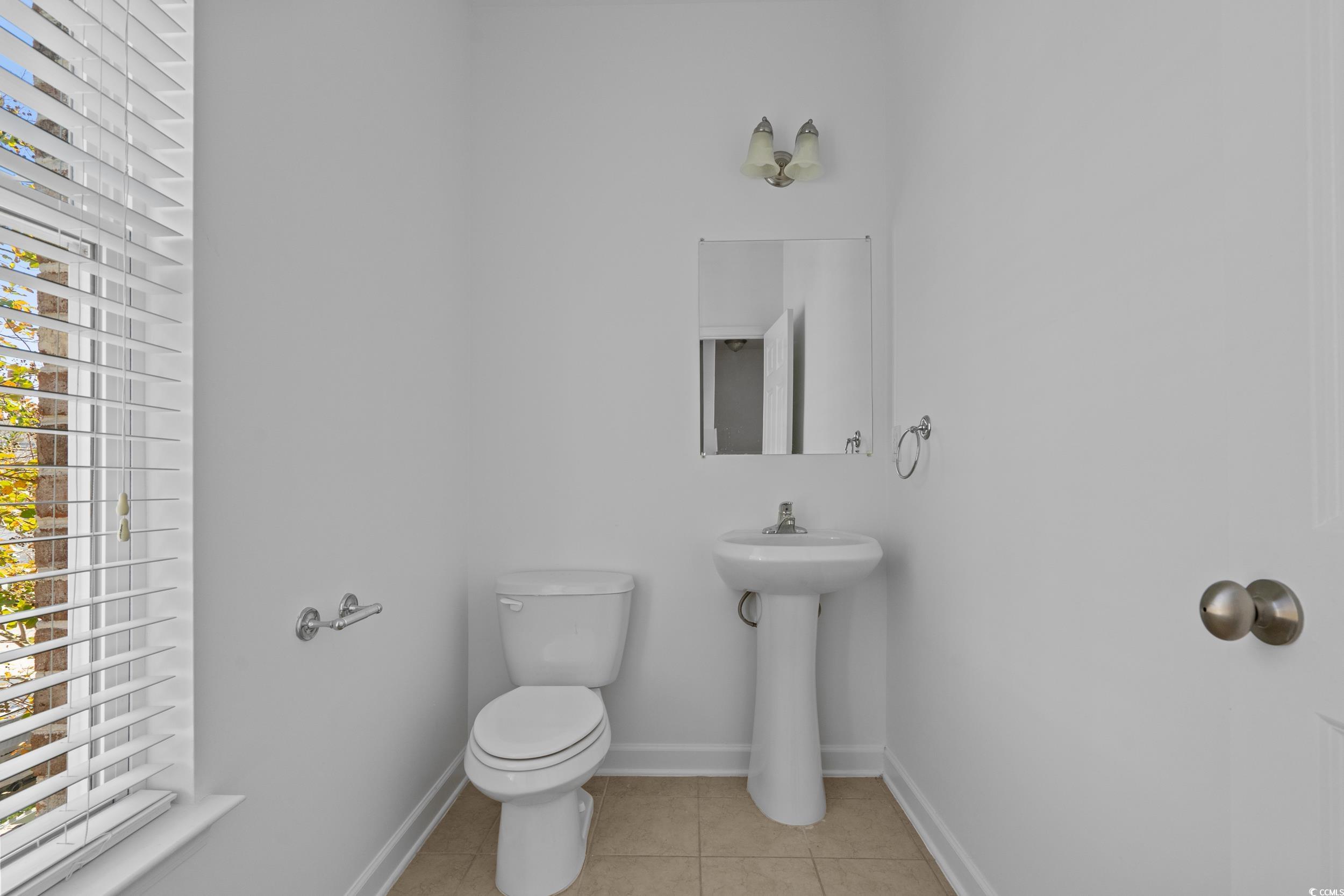 2798 Howard Avenue, Unit B Myrtle Beach, SC 29577 - Photo 25 of 40 Bathroom featuring light tile patterned floors and toilet