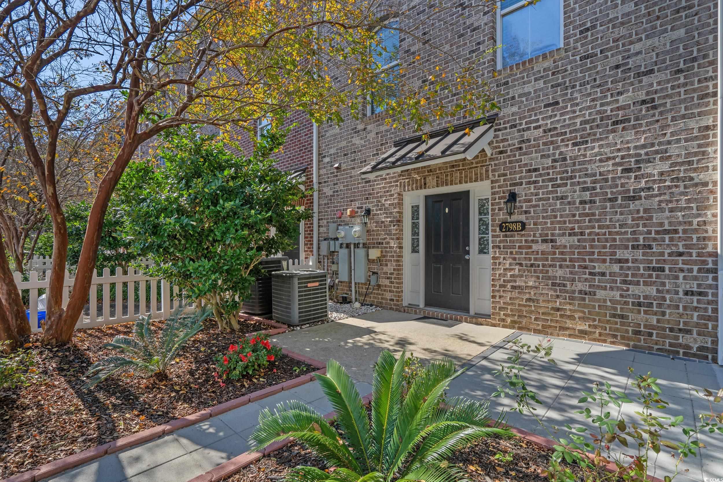 2798 Howard Avenue, Unit B Myrtle Beach, SC 29577 - Photo 28 of 40 Entrance to property featuring brick siding and a patio