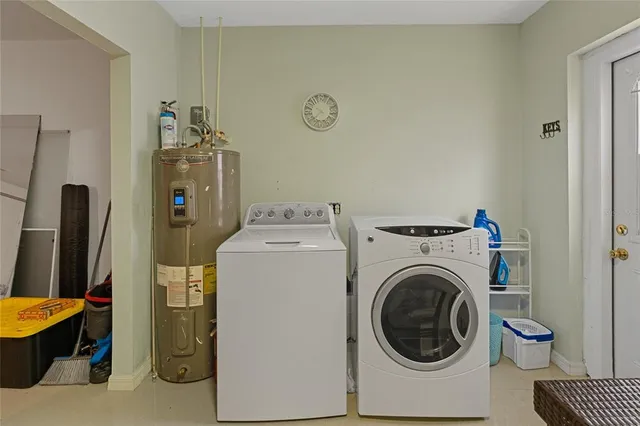 a utility room with dryer and washer