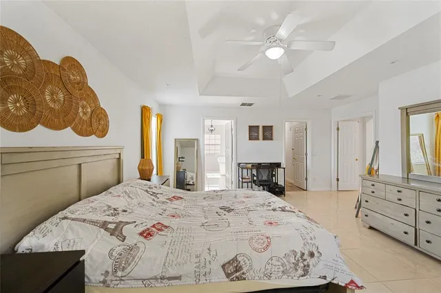 a bathroom with a sink toilet double vanity and mirror