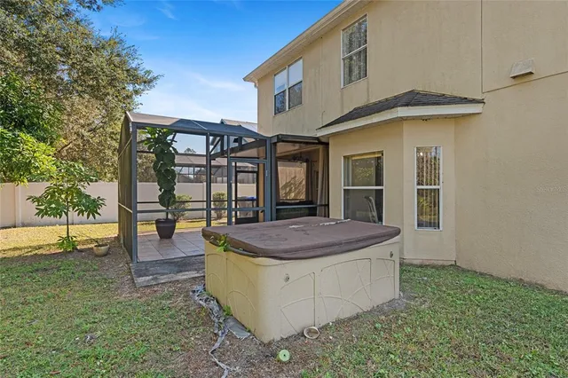 a backyard of a house with lots of green space