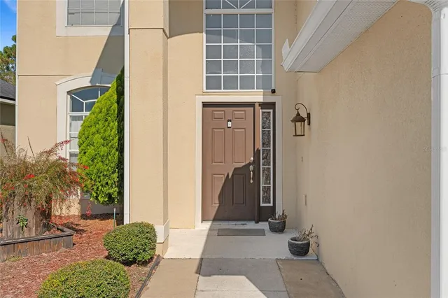 a view of a entryway door front of house