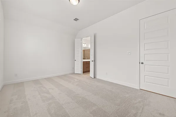 an empty room with an entryway