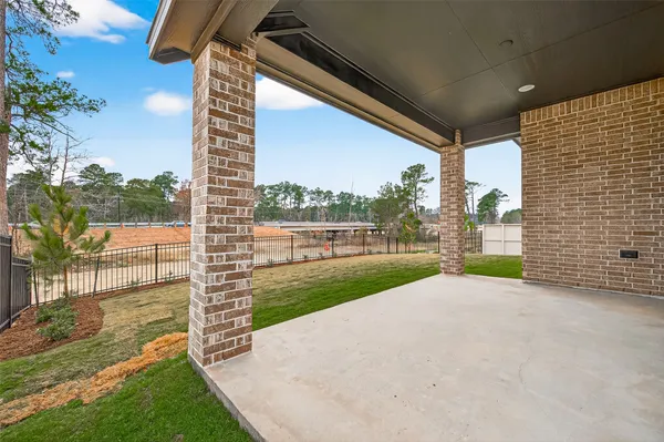 a view of a porch with a yard