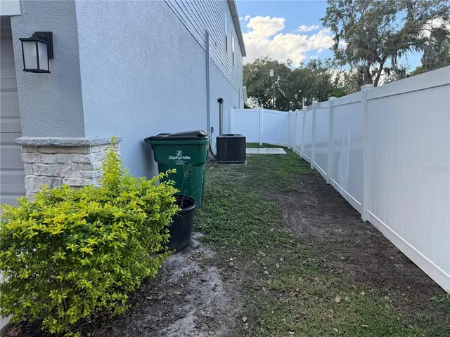 a view of a bathroom with a sink and a mirror