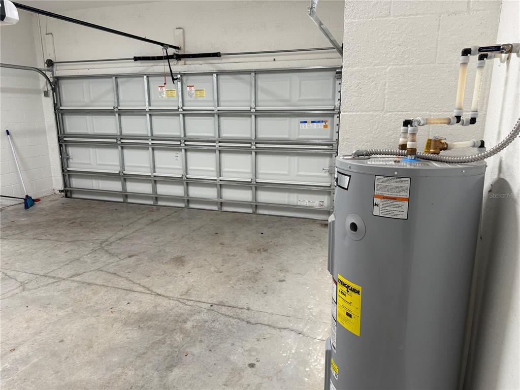 4920 8th Street Zephyrhills, FL 33542 - Photo 52 of 57 a view of storage and utility room