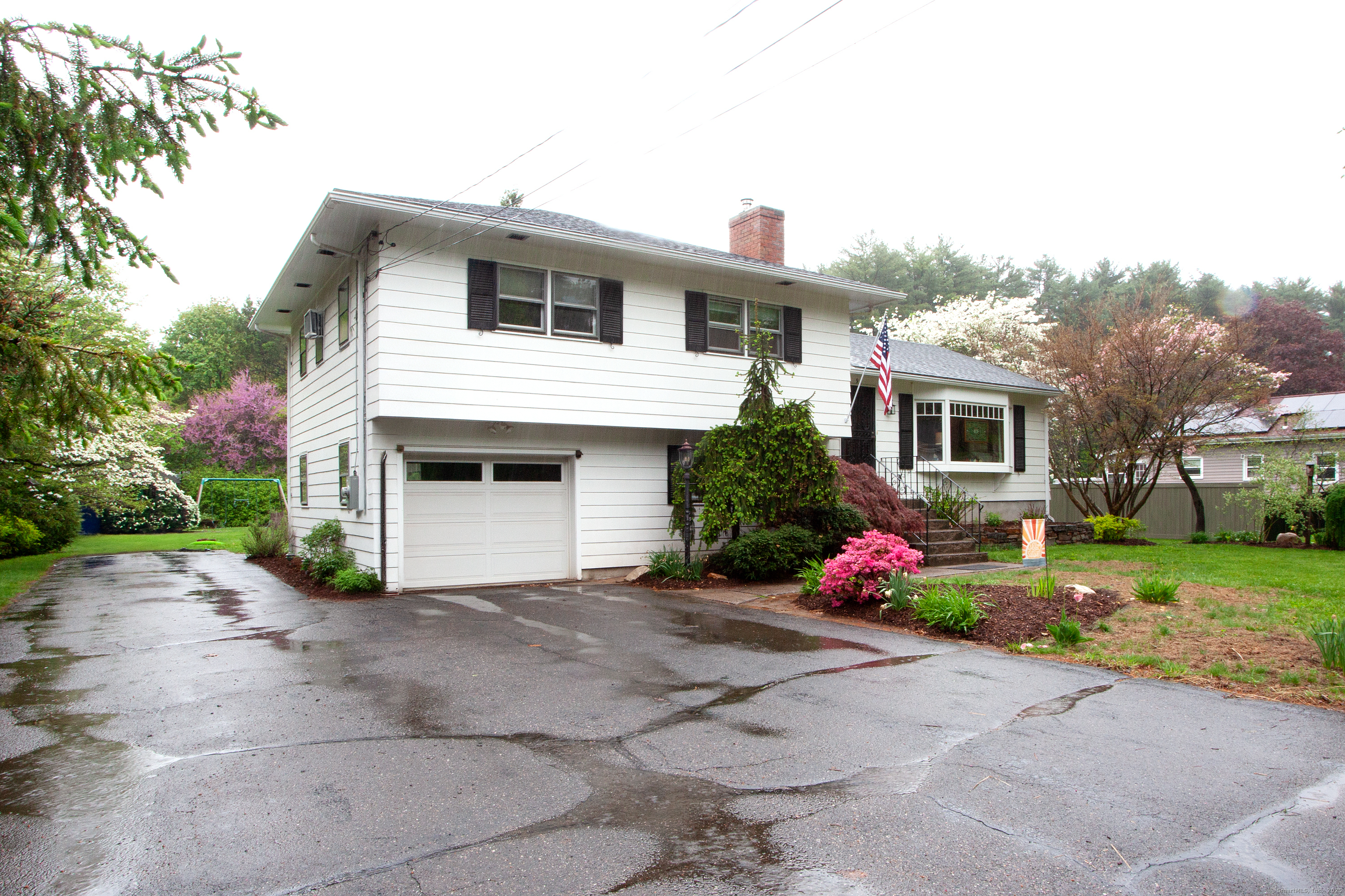 a front view of a house with yard
