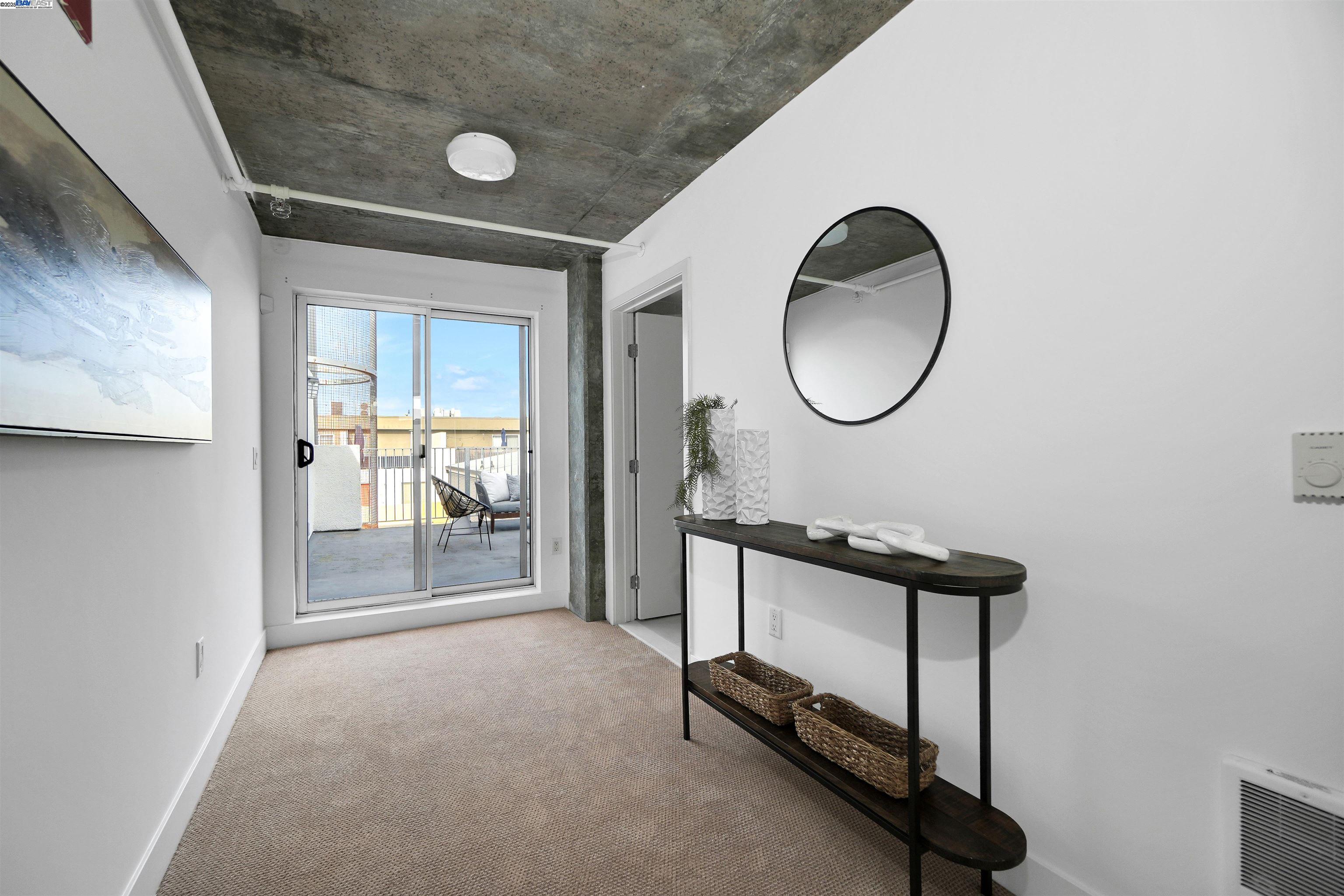 311 Oak Street, Unit PH25 Oakland, CA 94607 - Photo 9 of 14 a view of a room with gym equipment