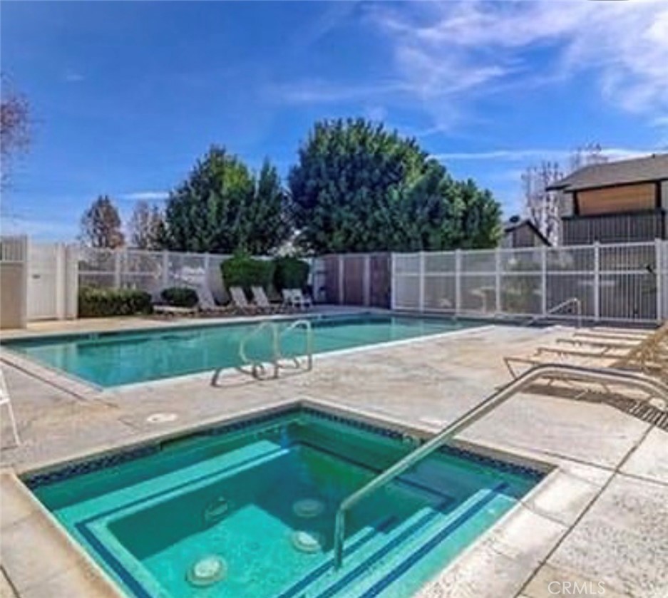 8990 19th Street, Unit 222 Rancho Cucamonga, CA 91701 - Photo 8 of 8 a view of a backyard with a small cabin