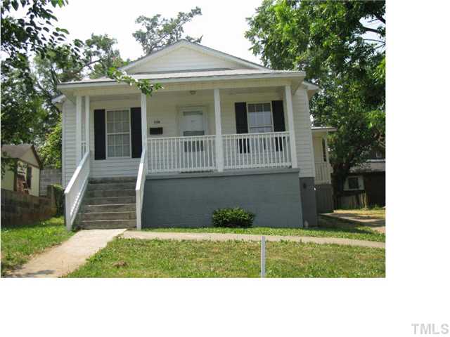 126 Bledsoe Avenue Raleigh, NC 27601 - Photo 3 of 12 a view of a house with a yard