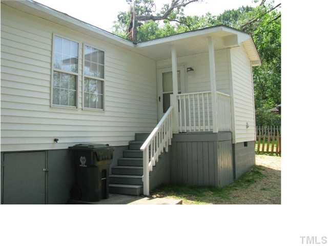 126 Bledsoe Avenue Raleigh, NC 27601 - Photo 4 of 12 a front view of a house with a garage