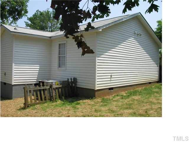 126 Bledsoe Avenue Raleigh, NC 27601 - Photo 5 of 12 a view of a backyard with a table and chairs